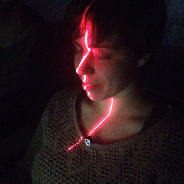 Nina having her face scanned